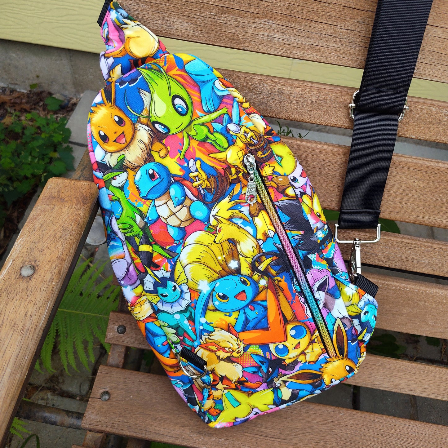 Bright Stacked Pocket Monsters Sling Backpack